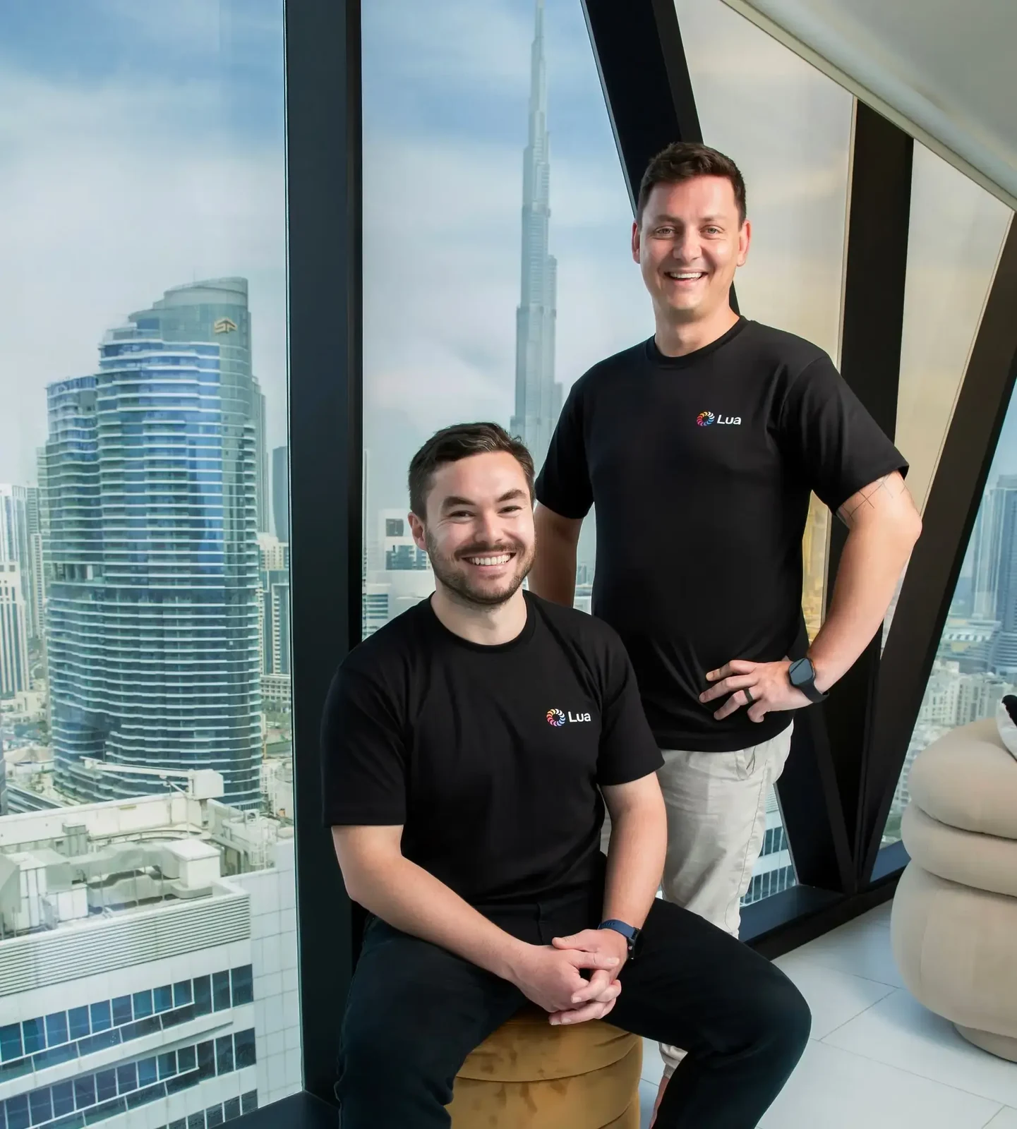 Lorcan and Stefan, the co-founders of Lua, in Lua tees against the Dubai skyline