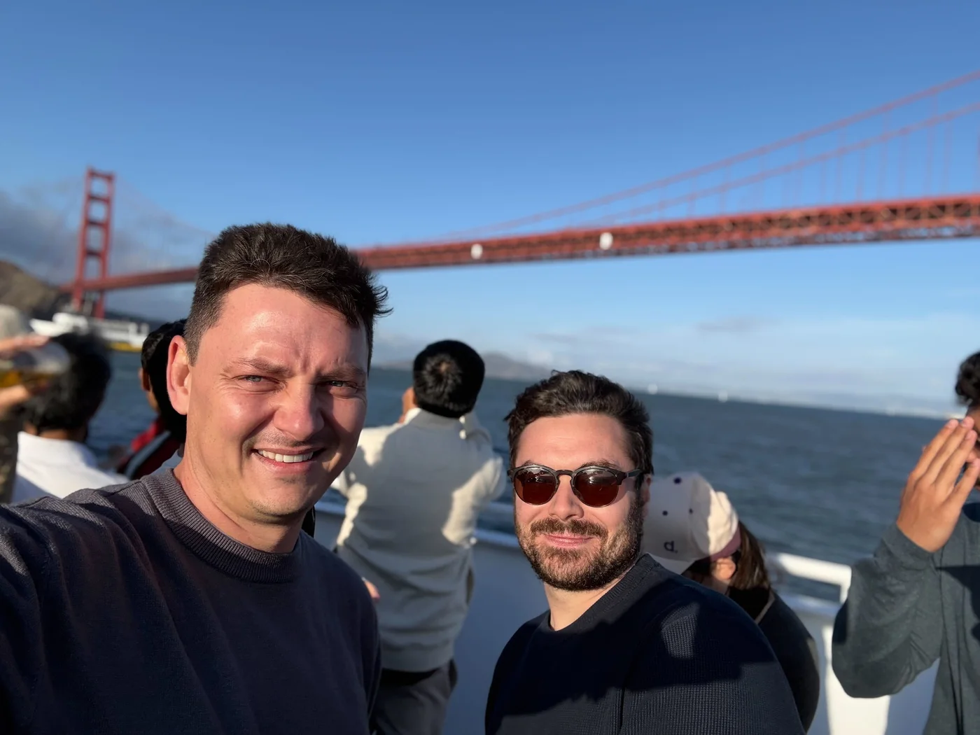 Stefan and Lorcan on a boat under the Golden Gate Bridge